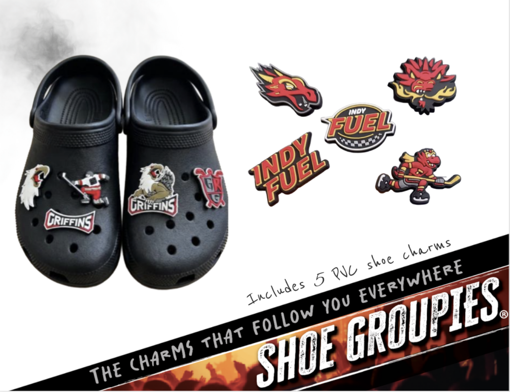 Shoe Groupies® custom team shoe charms on black clogs